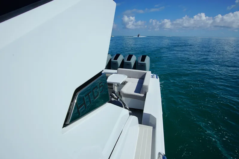  Yacht Photos Pics 2024 Uniesse HTC5P yacht on open sea with clear skies.