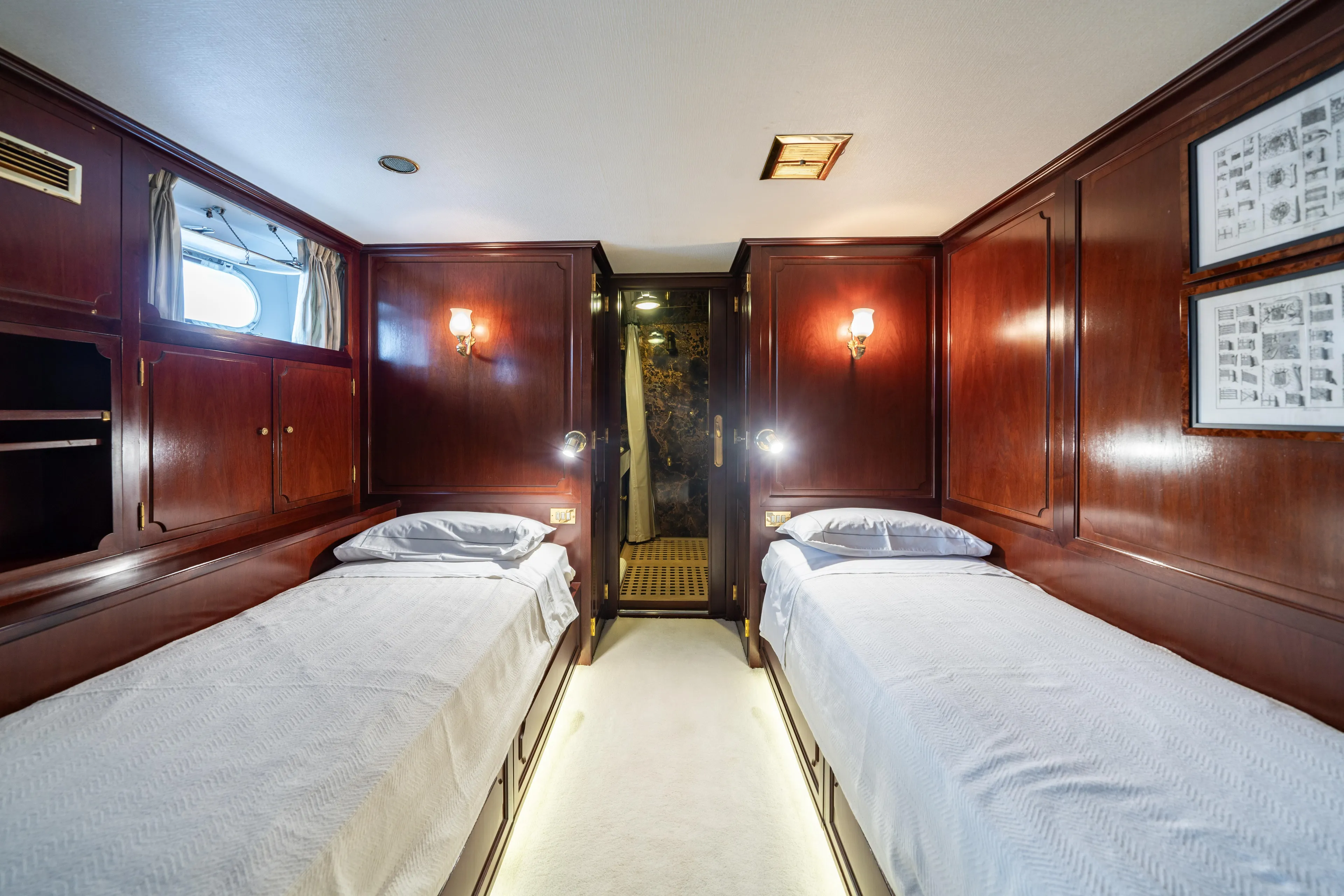 Bluemar II Yacht Photos Pics Luxurious twin cabin on a 1978 Feadship Classic yacht with elegant wood paneling.