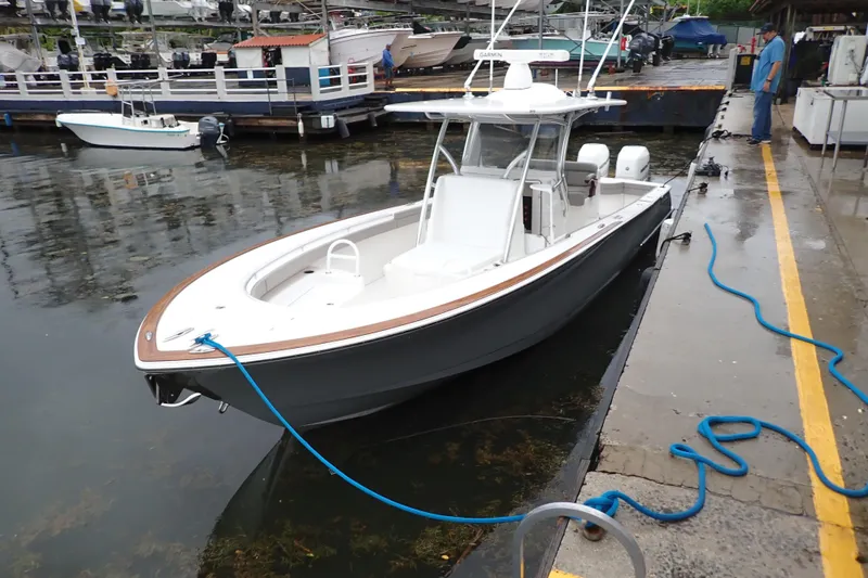 Archie Yacht Photos Pics 2021 Valhalla Boatworks V-33 docked, featuring sleek design and modern amenities.
