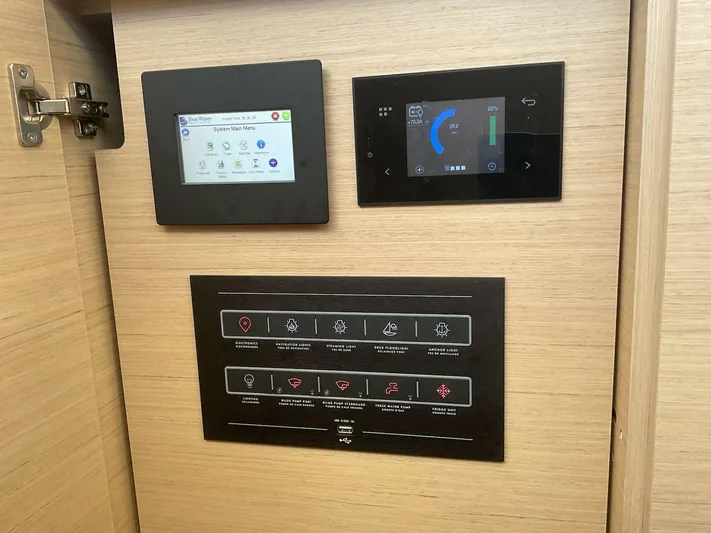 Jdmontt Yacht Photos Pics Control panels on 2024 Lagoon 55 yacht, featuring digital displays and system indicators.
