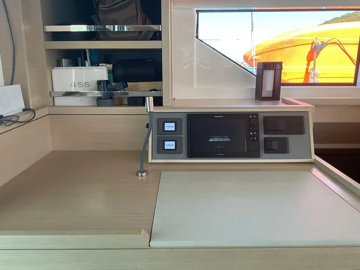 Jdmontt Yacht Photos Pics Modern kitchen area in 2024 Lagoon 55 yacht with sleek design and advanced appliances.