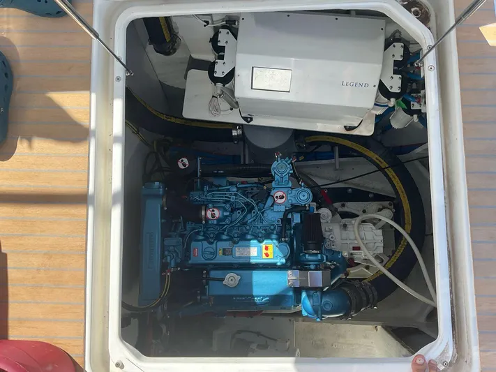 Jdmontt Yacht Photos Pics Engine compartment of a 2024 Lagoon 55 yacht, showcasing mechanical components and wiring.