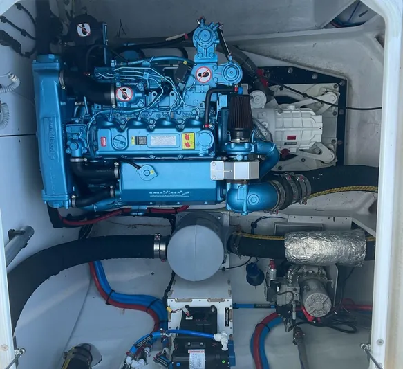 Jdmontt Yacht Photos Pics Engine compartment of 2024 Lagoon 55 yacht, showcasing detailed mechanical components.