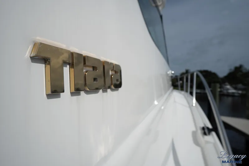 Legacy Yacht Photos Pics 2003 Tiara Yachts 4200 Open, side view with logo detail.