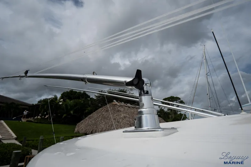 Legacy Yacht Photos Pics Tiara Yachts 4200 Open 2003 boat detail with cloudy sky background.