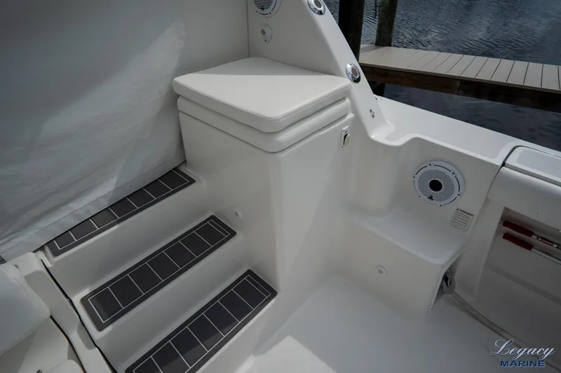 Legacy Yacht Photos Pics 2003 Tiara Yachts 4200 Open boat interior with steps and seating area.