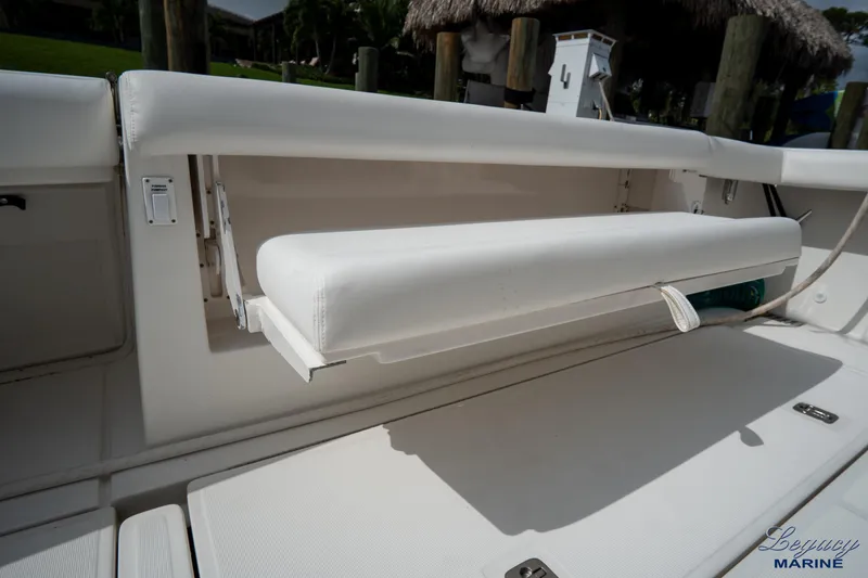 Legacy Yacht Photos Pics 2003 Tiara Yachts 4200 Open boat with foldable white bench seat.