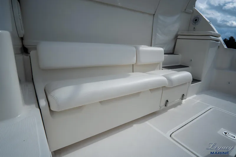 Legacy Yacht Photos Pics 2003 Tiara Yachts 4200 Open interior with white seating and steps.