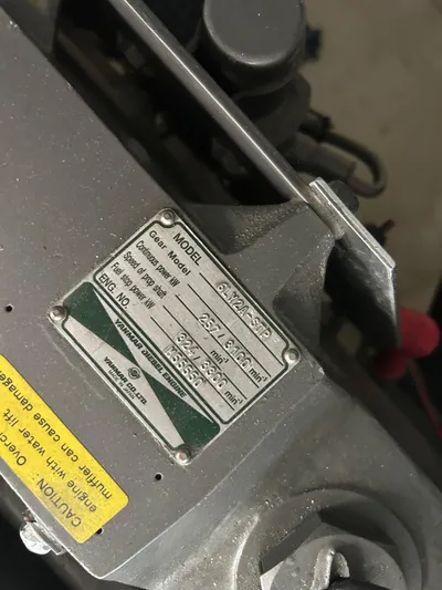 Bay Breeze Yacht Photos Pics Close-up of a Sabre 38 engine label, model year 2005, showing specifications and warnings.