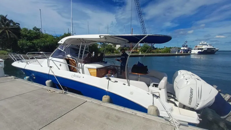 Jessica Yacht Photos Pics 2009 Sessa Marine Key Largo 36 boat docked, featuring sleek design and powerful Mercury engines.