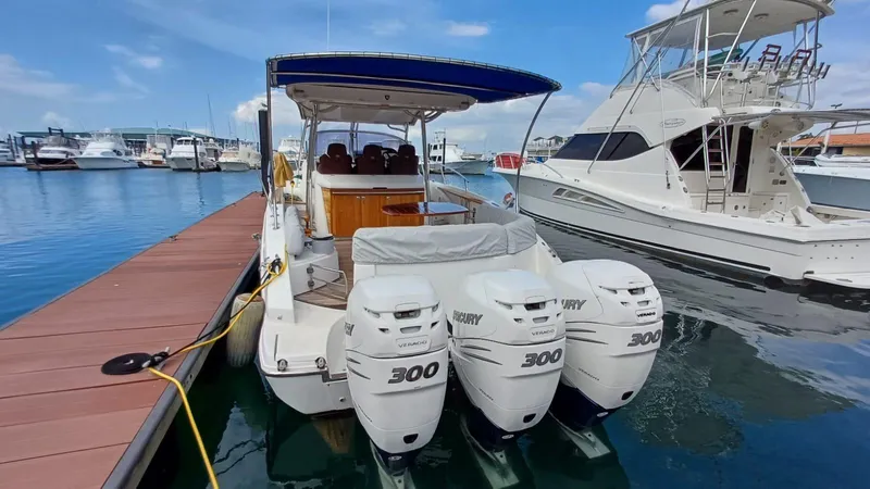 Jessica Yacht Photos Pics 2009 Sessa Marine Key Largo 36 with triple 300 HP engines docked at marina.