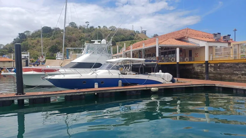 Jessica Yacht Photos Pics 2009 Sessa Marine Key Largo 36 docked at a marina with scenic background.