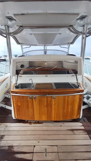 Jessica Yacht Photos Pics 2009 Sessa Marine Key Largo 36 boat with wooden cabinetry and outdoor sink.