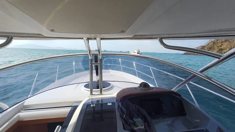 Jessica Yacht Photos Pics 2009 Sessa Marine Key Largo 36 boat cruising on clear blue waters.