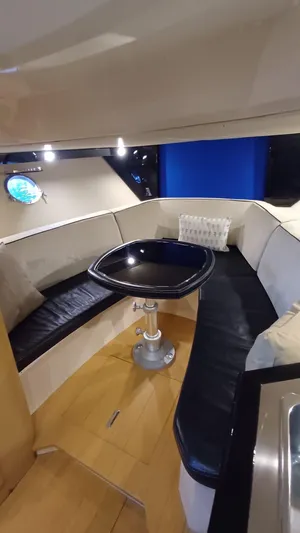 Jessica Yacht Photos Pics Interior of 2009 Sessa Marine Key Largo 36 with elegant seating and table.