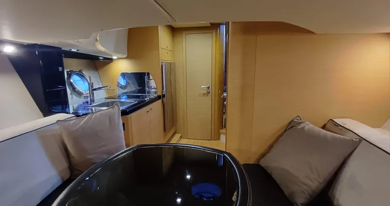 Jessica Yacht Photos Pics 2009 Sessa Marine Key Largo 36 interior with modern kitchen and cozy seating area.