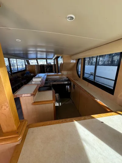  Yacht Photos Pics Interior of 2000 Bluewater Yachts 5200 Millenium with spacious layout and large windows.