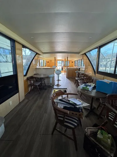  Yacht Photos Pics Interior of 2000 Bluewater Yachts 5200 Millenium with spacious seating and large windows.