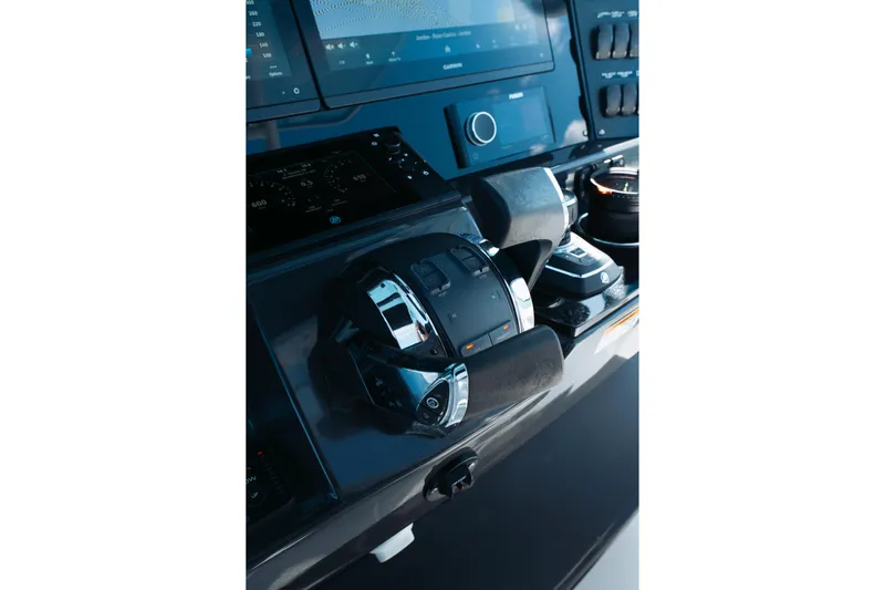 Lickety-split Yacht Photos Pics Control panel of 2021 Blackfin 332 CC boat with advanced navigation systems.