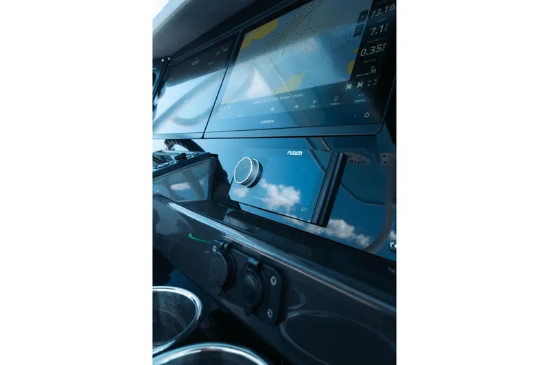 Lickety-split Yacht Photos Pics 2021 Blackfin 332 CC boat dashboard with Garmin and Fusion electronics.