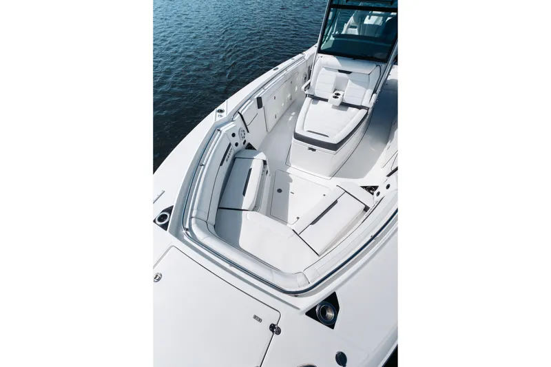 Lickety-split Yacht Photos Pics 2021 Blackfin 332 CC boat with spacious seating and sleek design on the water.