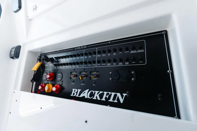 Lickety-split Yacht Photos Pics Control panel of 2021 Blackfin 332 CC boat, featuring switches and dials.