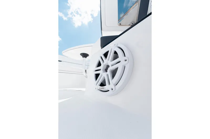 Lickety-split Yacht Photos Pics 2021 Blackfin 332 CC boat speaker detail with clear sky background.