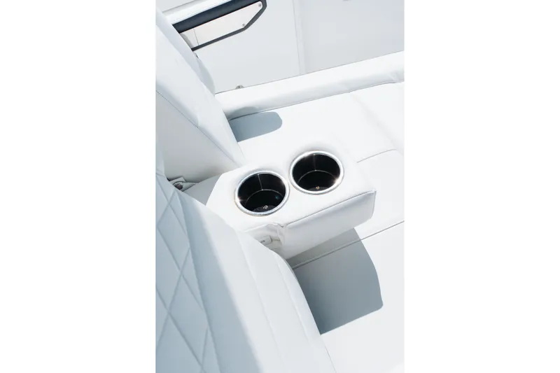 Lickety-split Yacht Photos Pics White leather seating with dual cup holders on a 2021 Blackfin 332 CC boat.