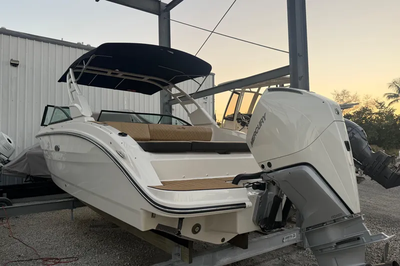 Yacht Photos Pics 2025 Sea Ray SDX 270 Outboard boat with Mercury engine, docked at sunset.