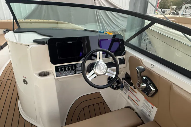 Yacht Photos Pics 2025 Sea Ray SDX 270 Outboard helm with modern controls and sleek design.