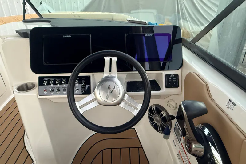  Yacht Photos Pics 2025 Sea Ray SDX 270 Outboard dashboard with steering wheel and control panel.