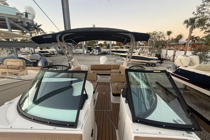  Yacht Photos Pics 2025 Sea Ray SDX 270 Outboard boat with sleek design and spacious seating.