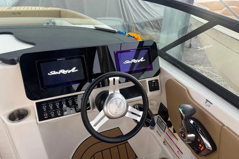  Yacht Photos Pics 2025 Sea Ray SDX 270 Outboard dashboard with dual Simrad displays and modern controls.