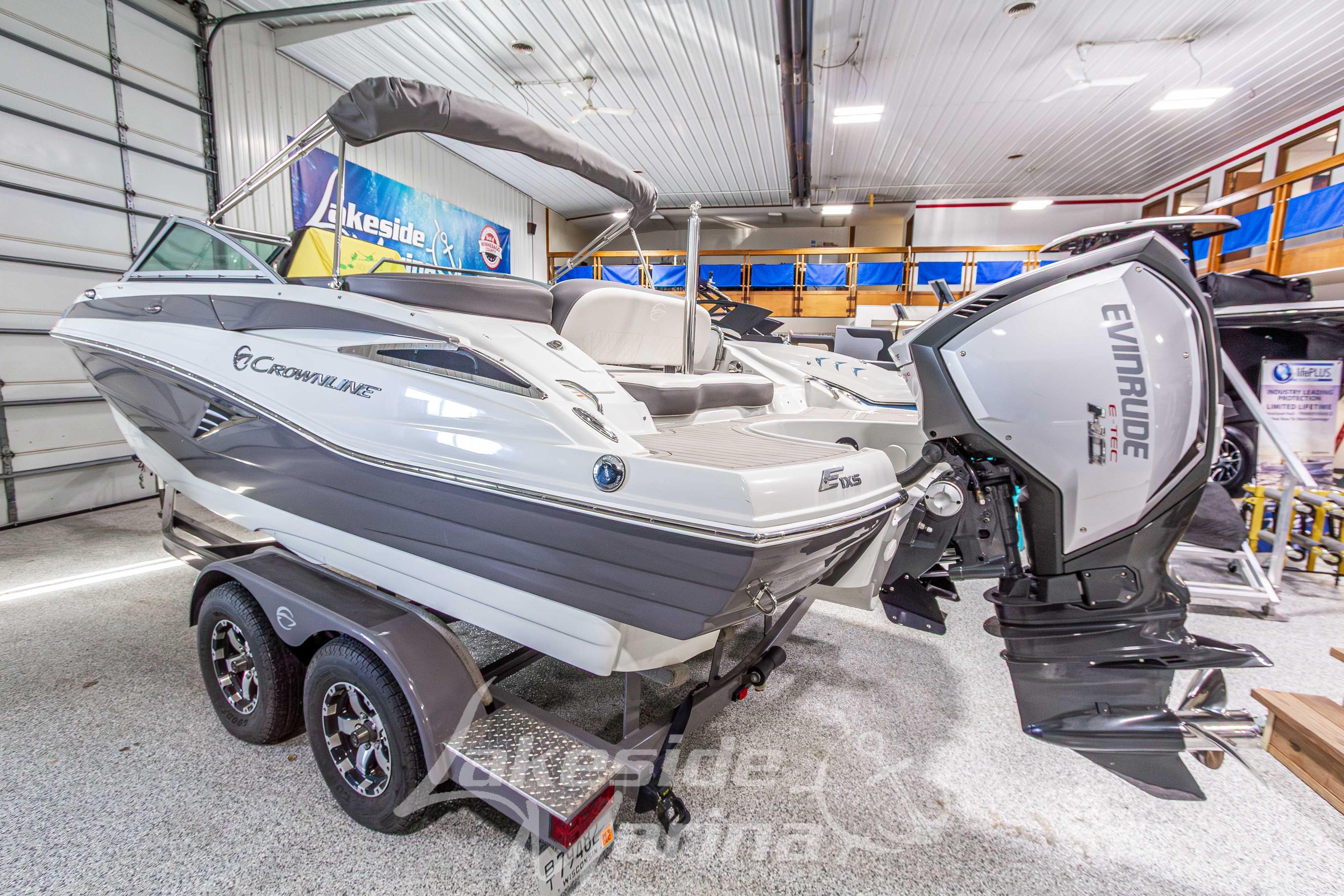 2017 Crownline Eclipse E1 XS boat with Evinrude engine in showroom.