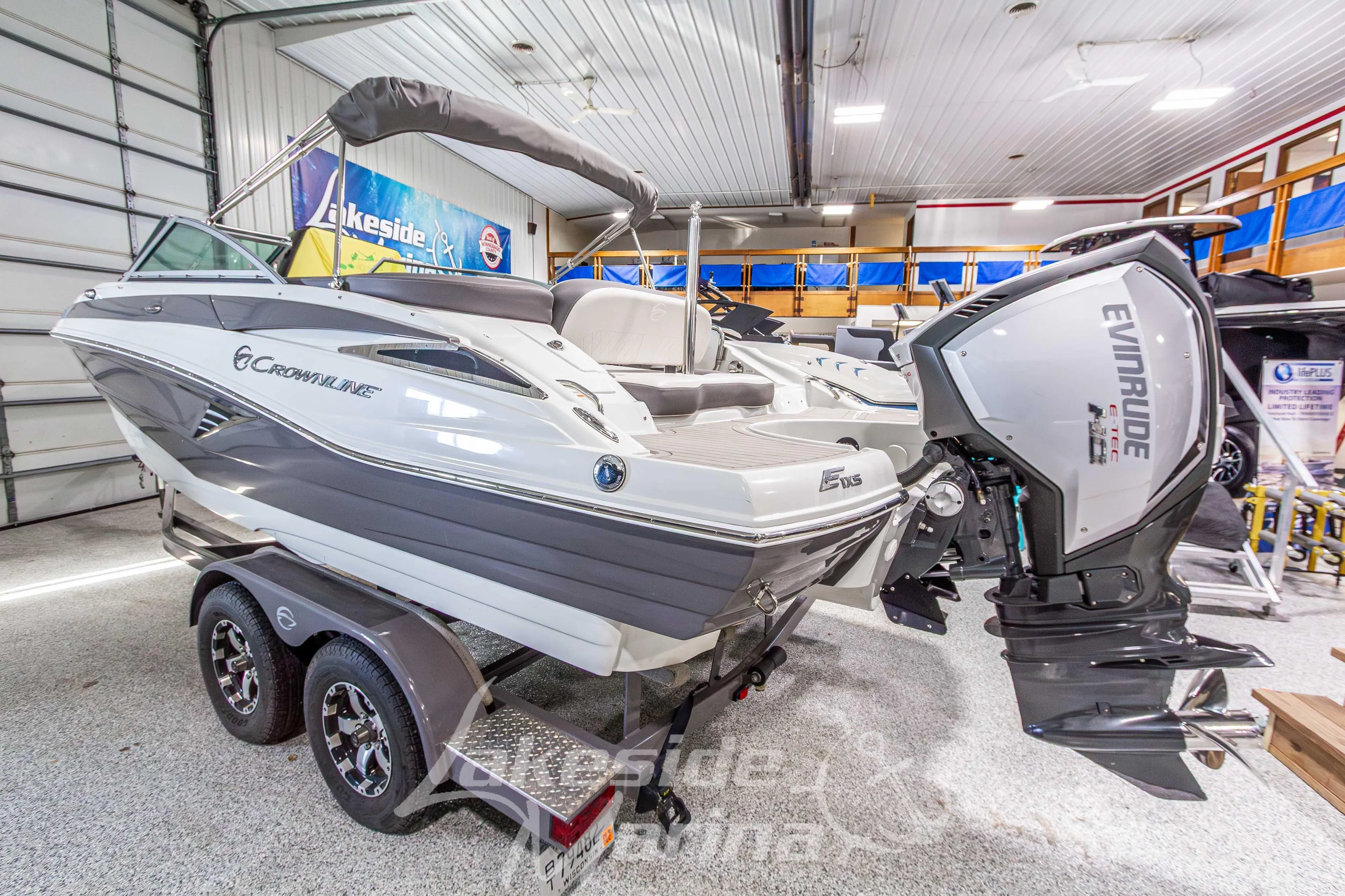 2017 Crownline Eclipse E1 XS boat with Evinrude engine in showroom.