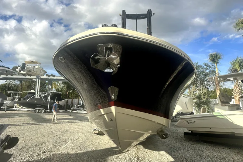  Yacht Photos Pics 2026 Chris-Craft Calypso 28 boat on display under a cloudy sky.