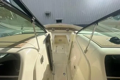  Yacht Photos Pics 2026 Chris-Craft Calypso 28 boat interior with open deck and sleek design.