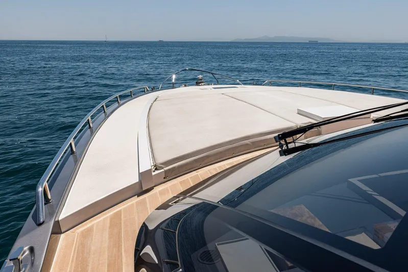 M/y Lioness Yacht Photos Pics Bow view of 2008 Baia Italia 70 yacht cruising on open sea.