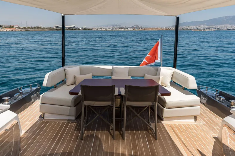 M/y Lioness Yacht Photos Pics Luxurious deck of 2008 Baia Italia 70 yacht with seating and sea view.