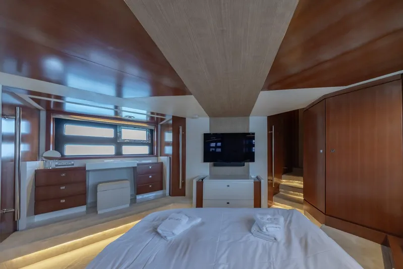 M/y Lioness Yacht Photos Pics Luxurious interior of 2008 Baia Italia 70 yacht with modern wood finishes and elegant design.