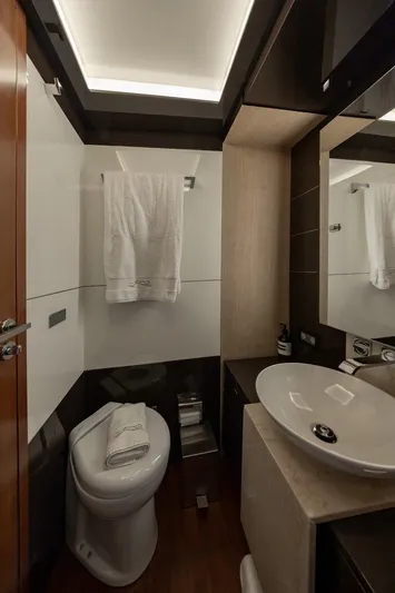 M/y Lioness Yacht Photos Pics Luxurious bathroom in 2008 Baia Italia 70 yacht with modern fixtures and elegant design.