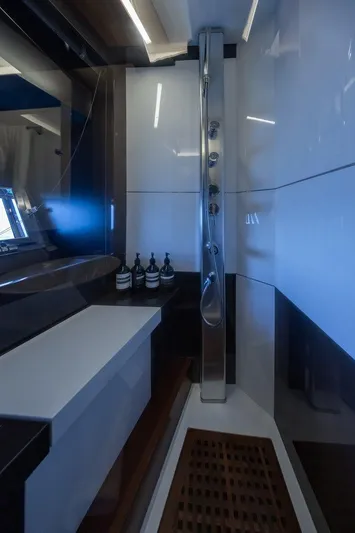 M/y Lioness Yacht Photos Pics Luxurious bathroom interior of 2008 Baia Italia 70 yacht with modern shower and sleek design.