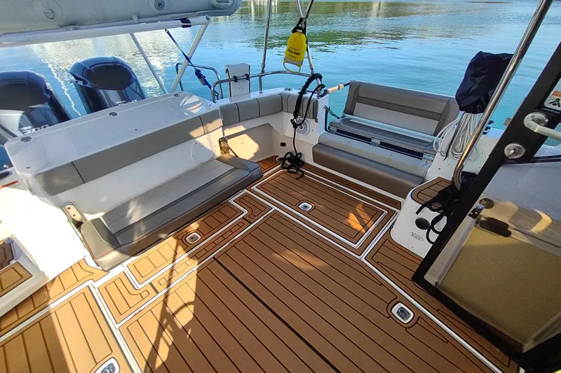 Wyvern Yacht Photos Pics 2020 Cutwater C-32 Coupe boat deck with seating and teak flooring.