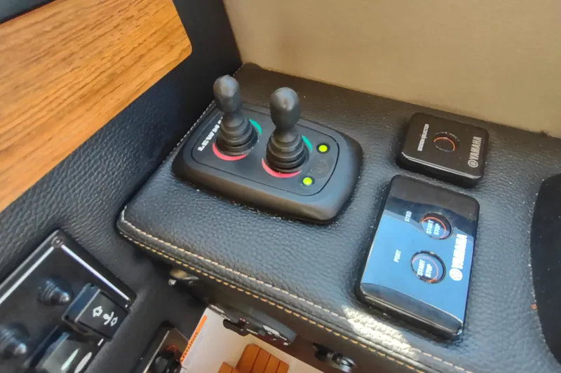 Wyvern Yacht Photos Pics Control panel of 2020 Cutwater C-32 Coupe with joysticks and Yamaha controls.