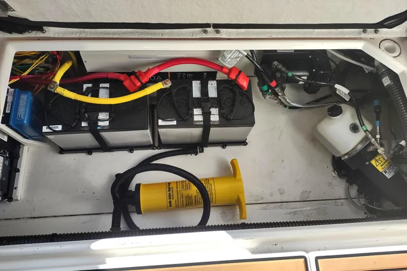 Wyvern Yacht Photos Pics 2020 Cutwater C-32 Coupe engine compartment with batteries and wiring.