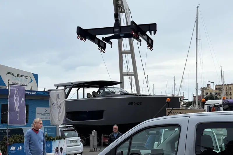  Yacht Photos Pics 2022 Cranchi A46 Luxury Tender being lifted at Palermo dockyard.