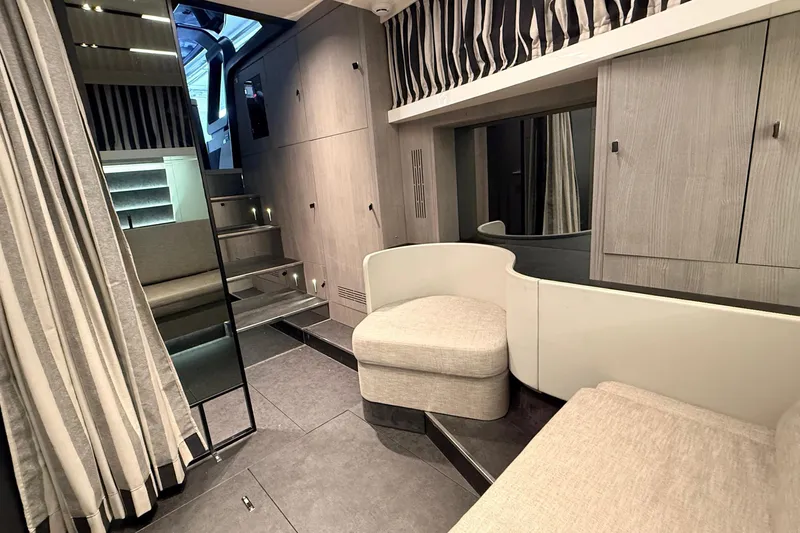  Yacht Photos Pics Luxurious interior of 2022 Cranchi A46 Luxury Tender with modern seating and elegant design.