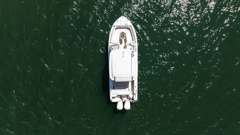  Yacht Photos Pics Aerial view of 2020 Grady-White Freedom 285 boat on open water.