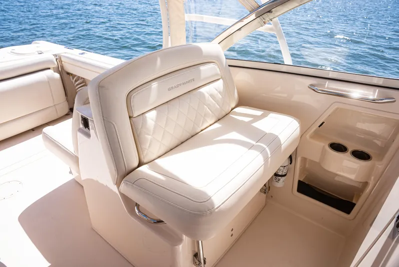  Yacht Photos Pics 2020 Grady-White Freedom 285 boat interior with luxurious seating and ocean view.