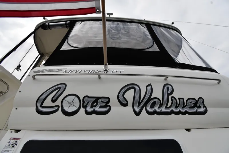 Core Values Yacht Photos Pics 2007 Cruisers Yachts 455 Express Motoryacht with "Core Values" name on stern.